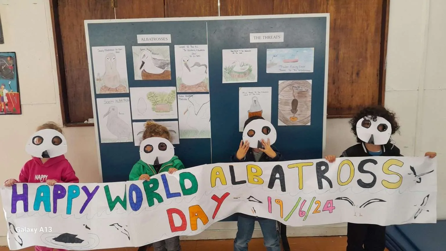 Students wearing their Albatross Masks c Maria Swain