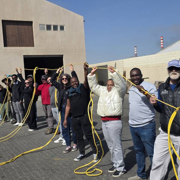 Attendees at ACAP’s Advisory Committee go on an excursion to Walvis Bay to learn about bird-scaring lines